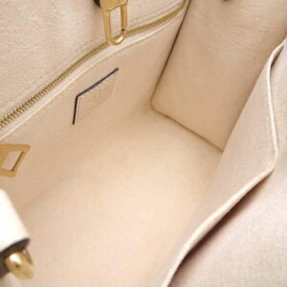Louis Vuitton On the Go Bag Empreinte Bicolor Creme Bois de Rose Pink